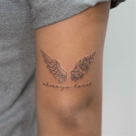 angel with wing tattoo